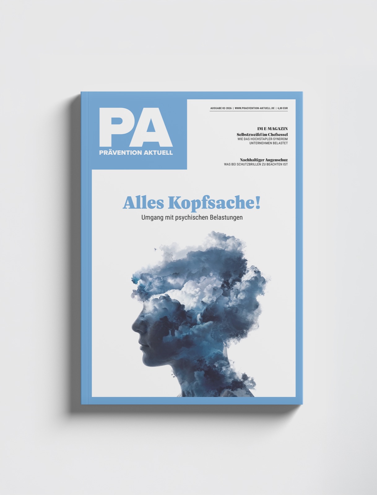 Prävention Aktuell, Ausgabe 2/26: Titelseite „Alles Kopfsache!“ mit einem Kopf aus Rauch
